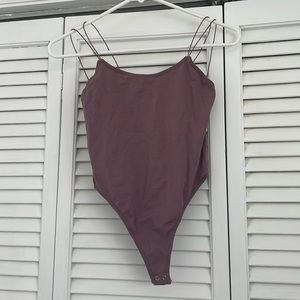 FP Asymmetrical Bodysuit